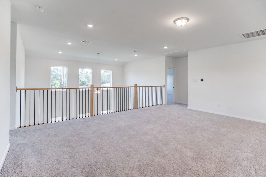 Spacious, unfurnished interior of a new home in Townsen Landing, Humble (Image 11).