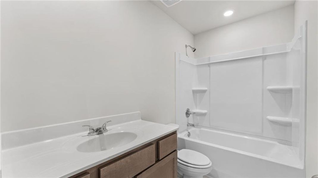 Furnished interior view inside a new home in Magnolia Trace, Flowery Branch (Image 5).