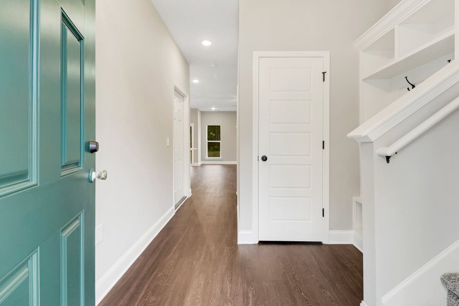 Edisto Foyer View with Mud Bench and Staircase