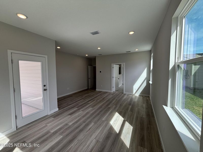 Spacious, unfurnished interior of a new home in The Cypress Series at Reserve East, Flagler Beach (Image 27).