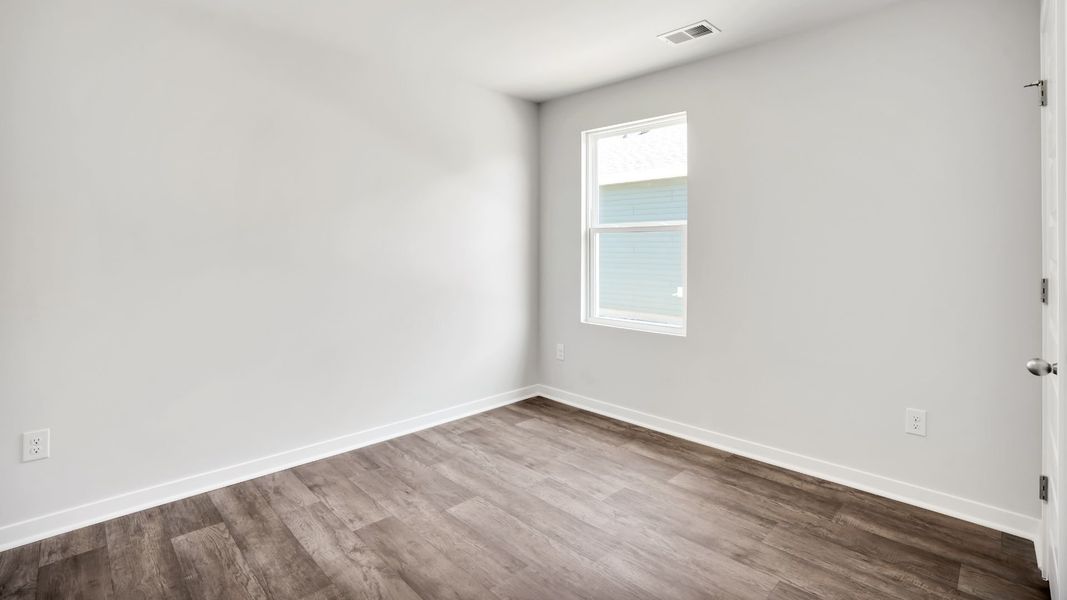 Spacious, unfurnished interior of a new home in Lockwood Landing, Supply (Image 25).