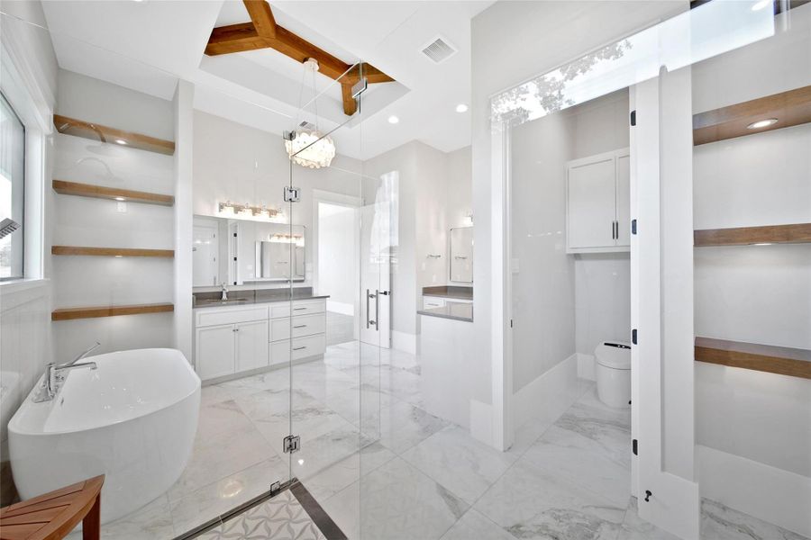 Accent lighting, wood beam, natural stone tie in with the look and feel of the entire home. Accent lighting, wood beam, natural stone tie in with the look and feel of the entire home.