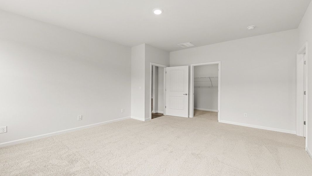Representative unfurnished interior of a home built from the Booth by D.R. Horton in Liberty Crossing, Braselton (Image 23).