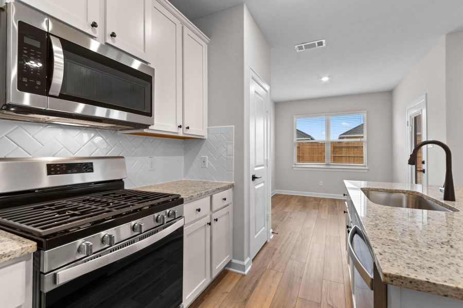 Furnished interior view inside a new home in Emberly, Beasley (Image 5).