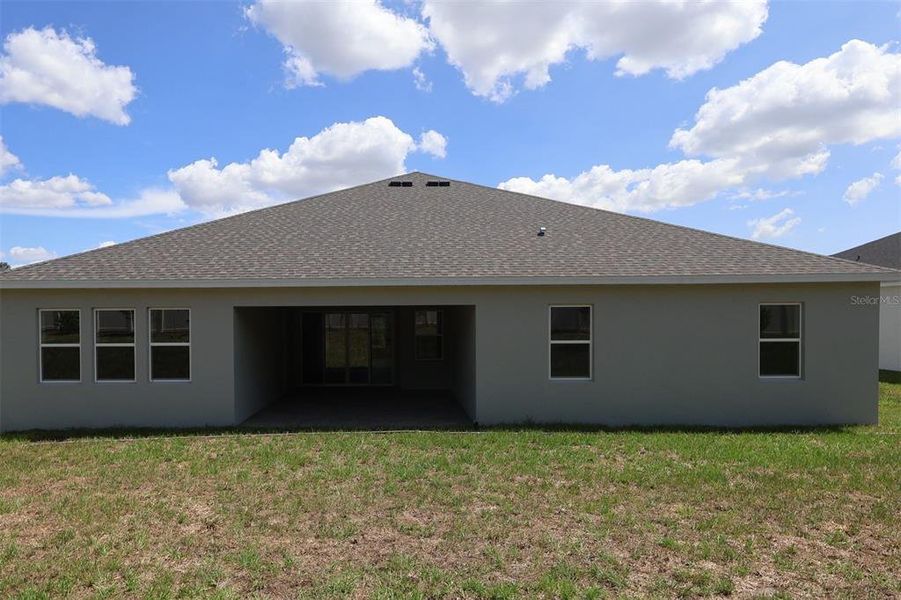 Exterior details and patio area of a home in Wolf Lake Ranch, Apopka (Image 10).