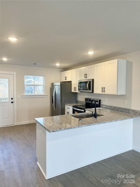 Furnished interior view inside a new home in , Hickory (Image 7).
