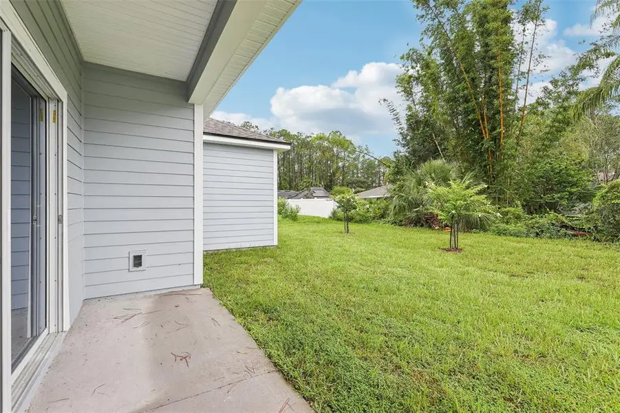 Exterior details and patio area of a home in , Palm Coast (Image 23).