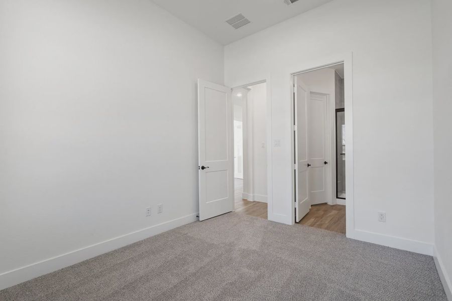 Representative unfurnished interior of a home built from the Malibu by Chesmar Homes in Fulshear Lakes, Fulshear (Image 20).