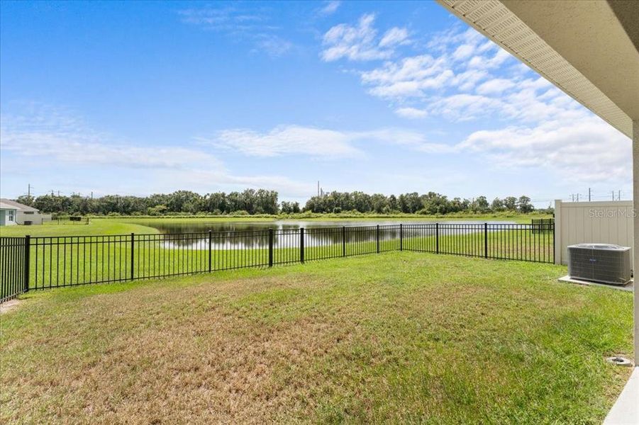 Exterior details and patio area of a home in Bella Lago, Parrish (Image 2).