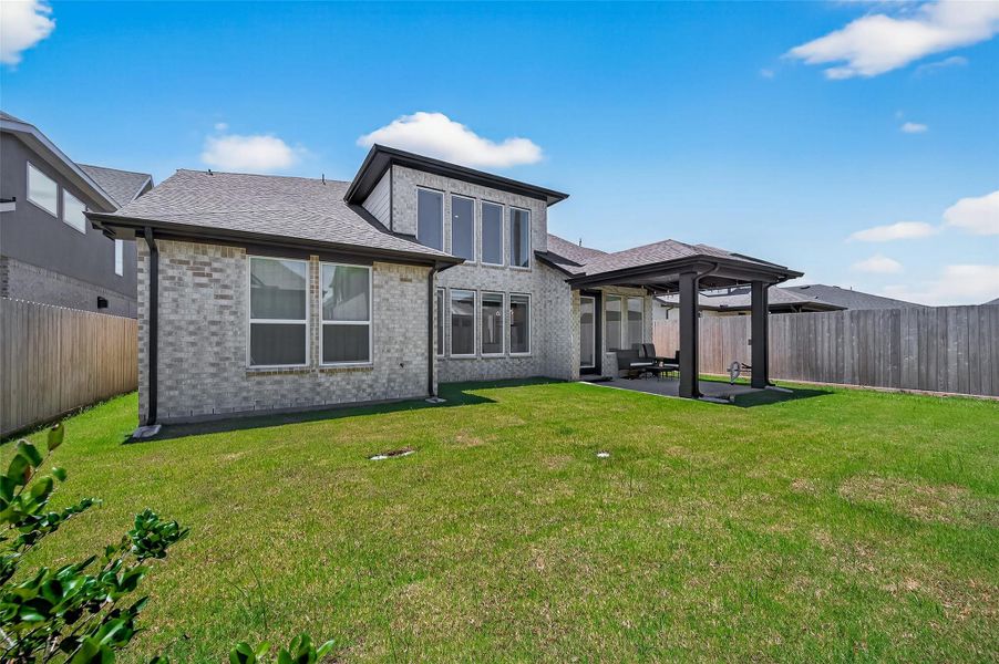 Front exterior of a new home in , Richmond, TX, highlighting curb appeal (Image 20). Front exterior of a new home in , Richmond, TX, highlighting curb appeal (Image 20).
