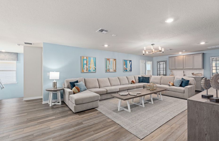 Representative furnished interior of a home built from the Baymont by Pulte Homes in Windsor Cay Resort, Clermont (Image 9).