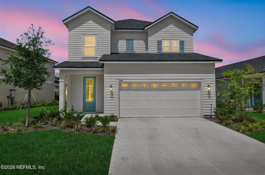 Front exterior of a new home in TrailMark, St. Augustine, FL, highlighting curb appeal (Image 28). Front exterior of a new home in TrailMark, St. Augustine, FL, highlighting curb appeal (Image 28).