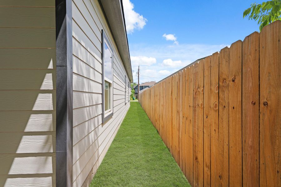 Exterior details and patio area of a home in , Houston (Image 23).