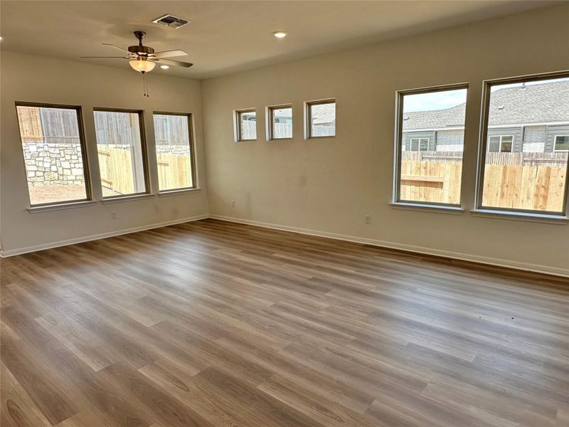 Unfurnished room with light wood finished floors, recessed lighting, and ceiling fan