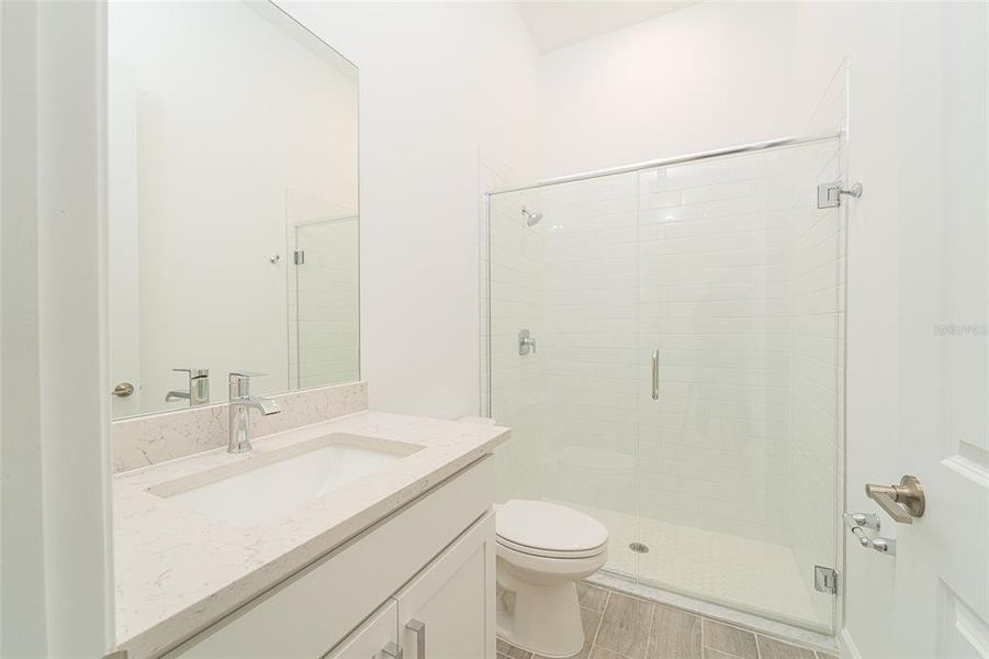Furnished interior view inside a new home in Tesoro Club, Port St. Lucie (Image 8).