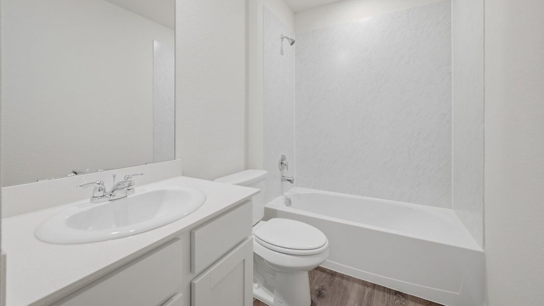 Representative furnished interior of a home built from the Bellvue by D.R. Horton in Whitewing Trails, Princeton (Image 6).