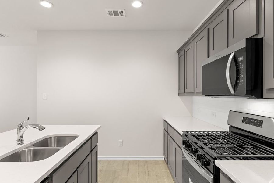 Front exterior of a new home in Northspur, Terrell, TX, highlighting curb appeal (Image 6). Front exterior of a new home in Northspur, Terrell, TX, highlighting curb appeal (Image 6).