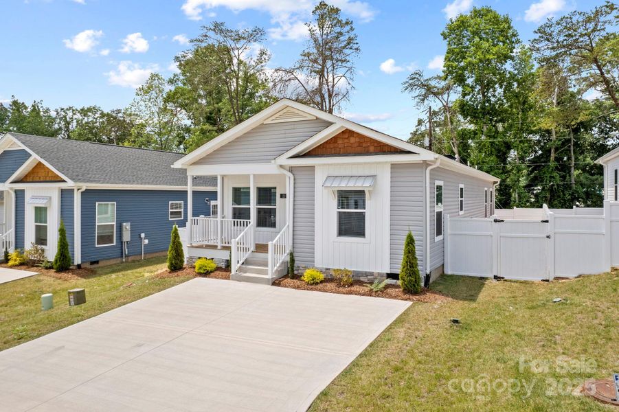 Front exterior of a new home in , Asheville, NC, highlighting curb appeal (Image 20).