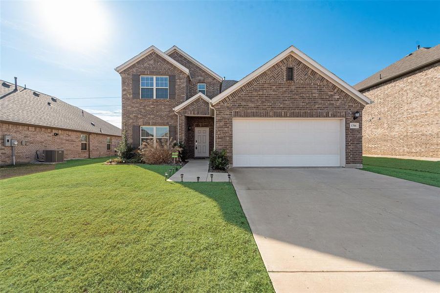 Front exterior of a new home in Hunters Ridge, Crowley, TX, highlighting curb appeal (Image 26).