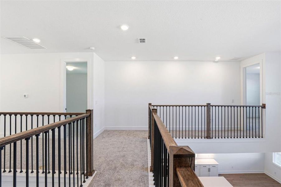 Spacious, unfurnished interior of a new home in Vida's Way, Wesley Chapel (Image 53).