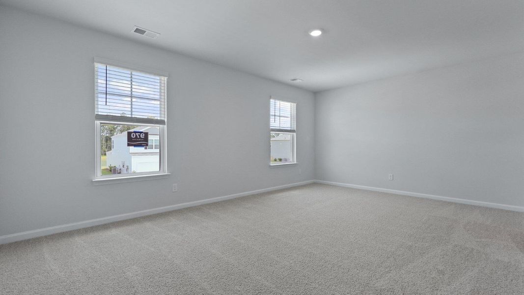 Spacious, unfurnished interior of a new home in Pine Hills at Cane Bay, Summerville (Image 14).