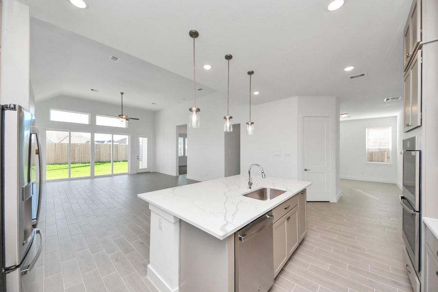 Furnished interior view inside a new home in Meridiana, Manvel (Image 8).