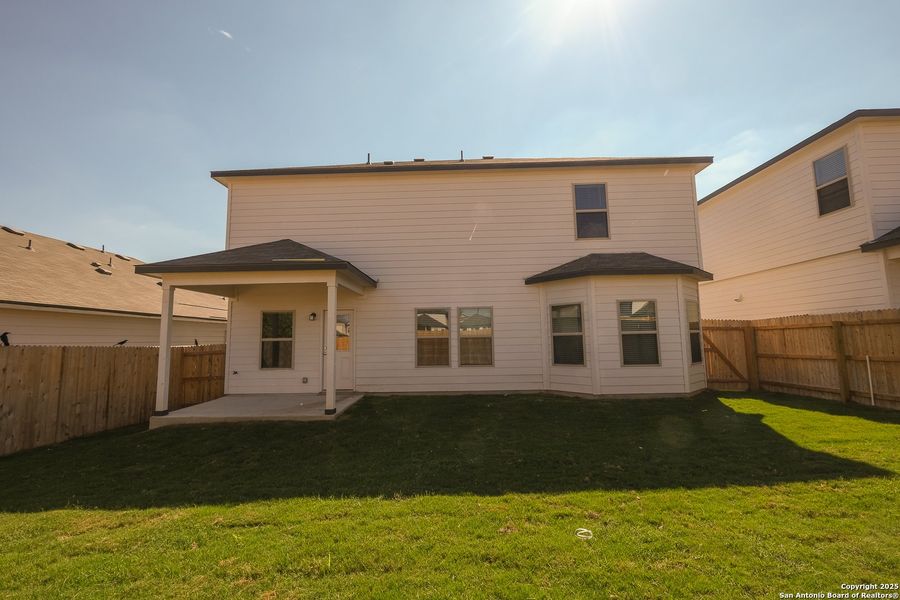 Exterior details and patio area of a home in Paloma Park, Converse (Image 4).