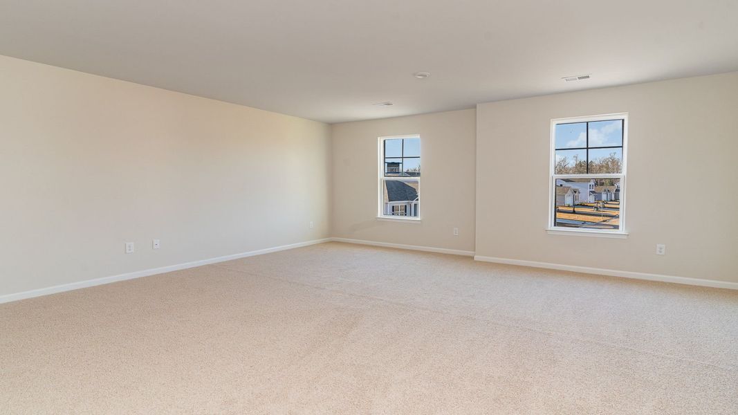 Representative unfurnished interior of a home built from the WREN by D.R. Horton in Saltgrass Landing, Winnabow (Image 23).