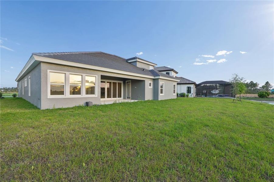 Exterior details and patio area of a home in , Zephyrhills (Image 4).