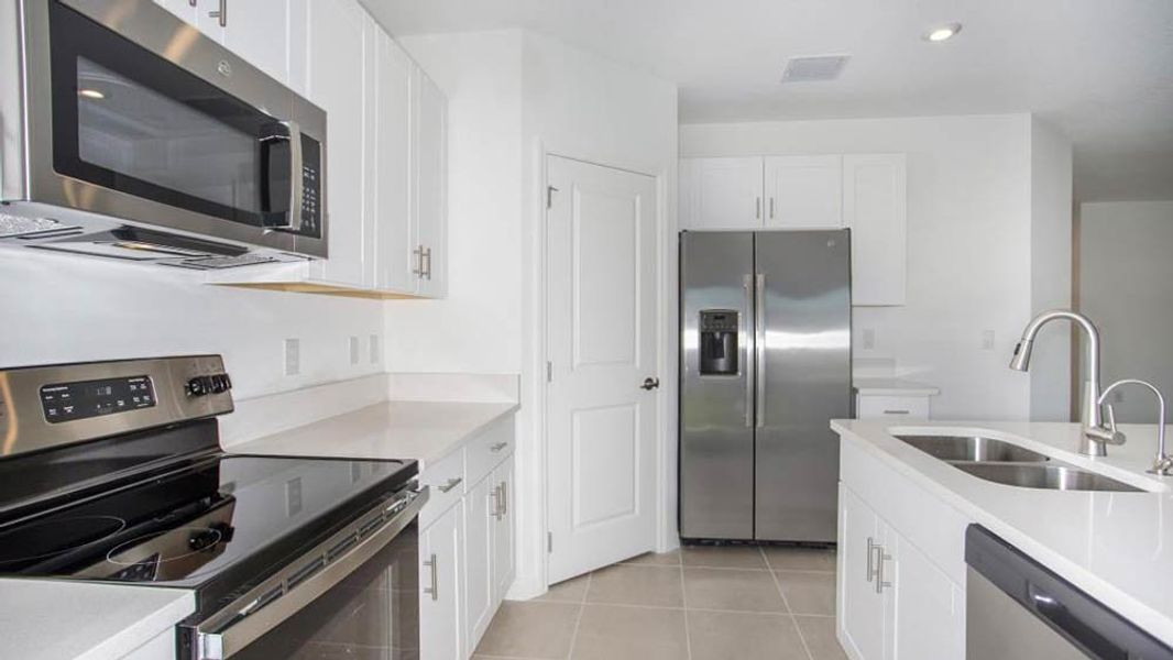 Representative furnished interior of a home built from the Ambrosia by Taylor Morrison in Palm Wind, Hudson (Image 67). Representative furnished interior of a home built from the Ambrosia by Taylor Morrison in Palm Wind, Hudson (Image 67).