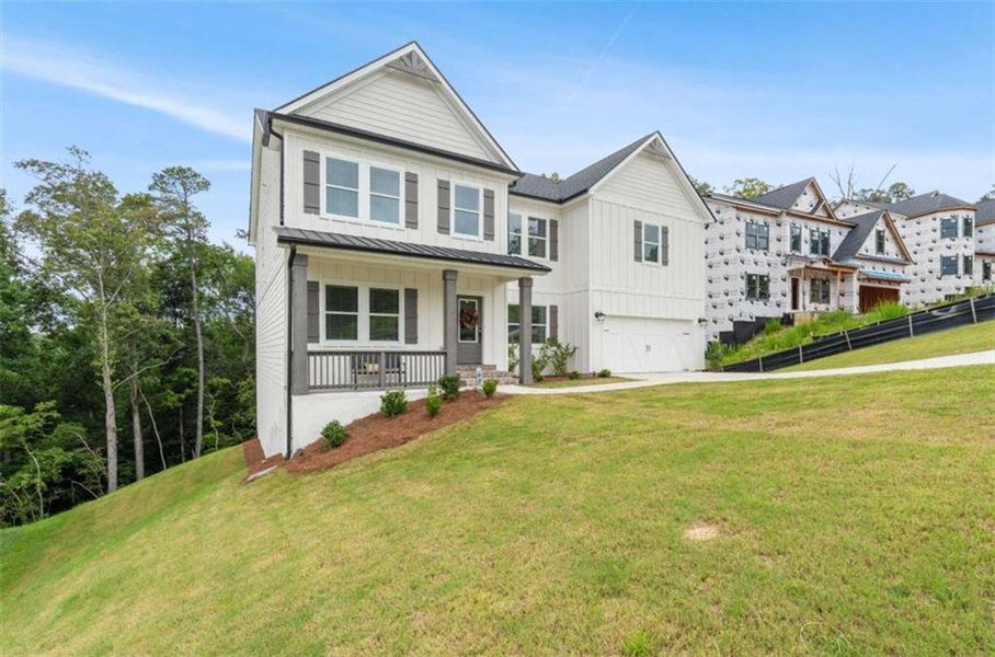 Front exterior of a new home in Silvercrest Lakes, Acworth, GA, highlighting curb appeal (Image 29).