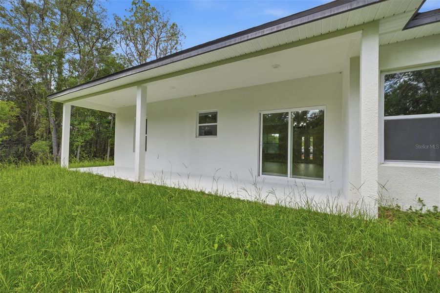 Exterior details and patio area of a home in , Citrus Springs (Image 19).
