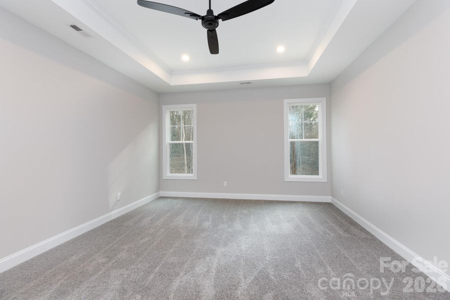Primary bedroom with plenty of natural light. Primary bedroom with plenty of natural light.