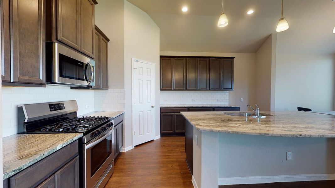 Representative furnished interior of a home built from the Floor Plan 3256 by Colina Homes in Grand Magnolia, Magnolia (Image 8).