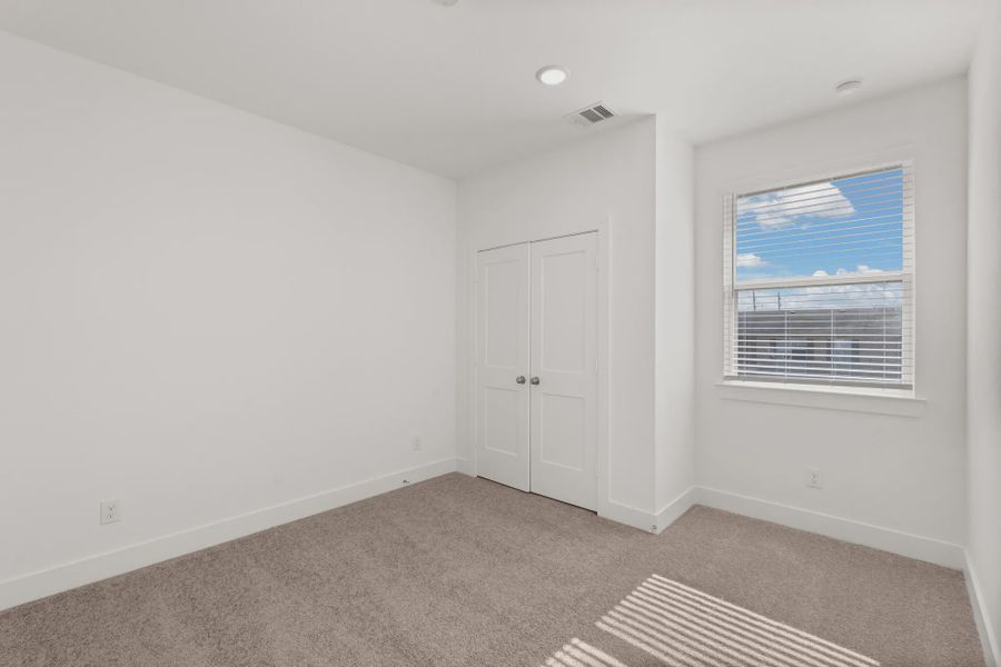 Representative unfurnished interior of a home built from the Cheverny by Chesmar Homes in Sienna Chateau, Missouri City (Image 22).