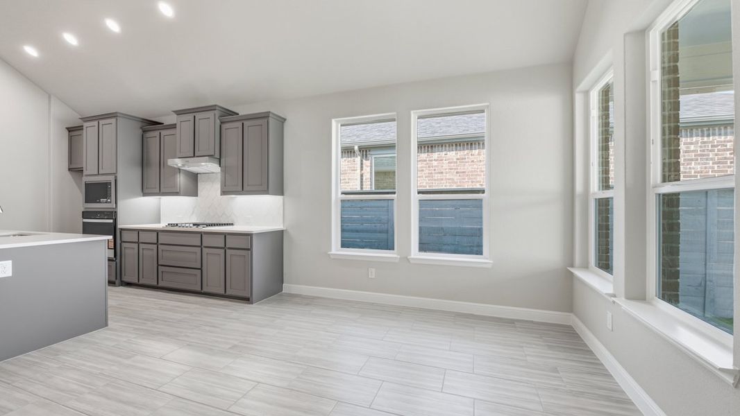 Representative furnished interior of a home built from the BASSWOOD by D.R. Horton in Treeline, Justin (Image 15).