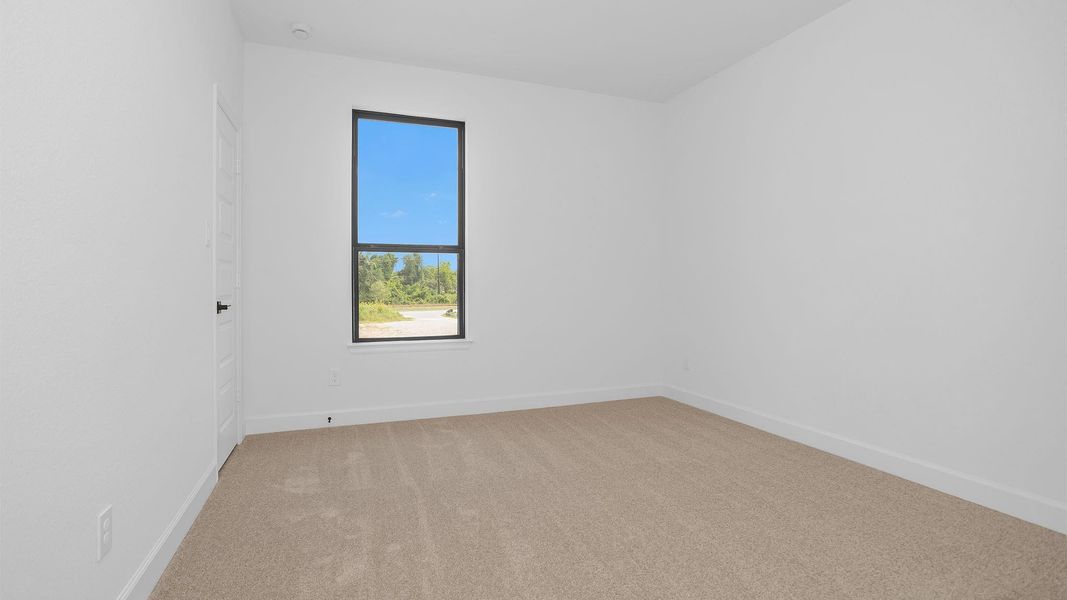 Spacious, unfurnished interior of a new home in Sienna, Missouri City (Image 6).