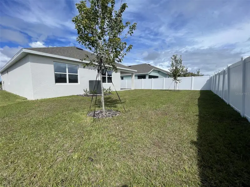 Exterior details and patio area of a home in Annabelle Estates, Winter Haven (Image 1). Exterior details and patio area of a home in Annabelle Estates, Winter Haven (Image 1).