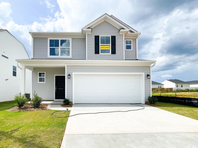 Front exterior of a new home in Harrington, Greenville, SC, highlighting curb appeal (Image 1).