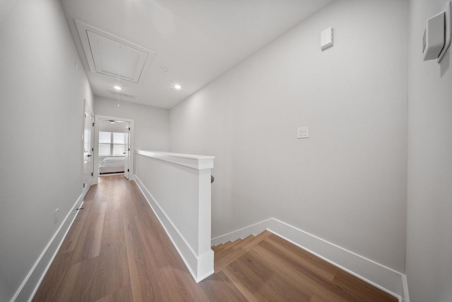 Spacious, unfurnished interior of a new home in Skyline Homes at Lou Ellen, Houston (Image 20).