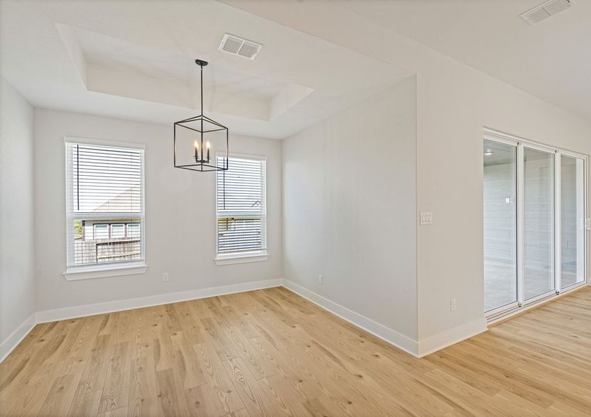 The dining room has two large windows that let in great, natural light. The dining room has two large windows that let in great, natural light.