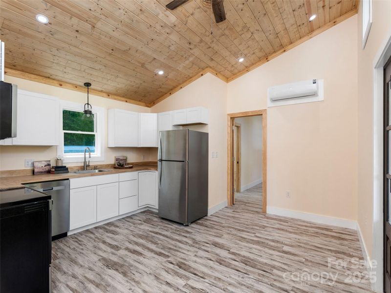 Furnished interior view inside a new home in , Waynesville (Image 6).