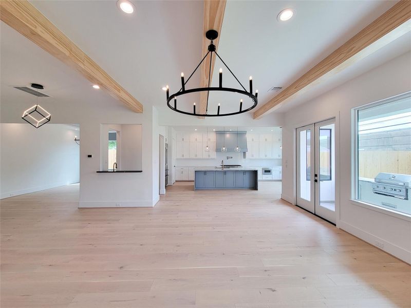 Living, formal dining, butler's panty, kitchen and outdoor kitchen