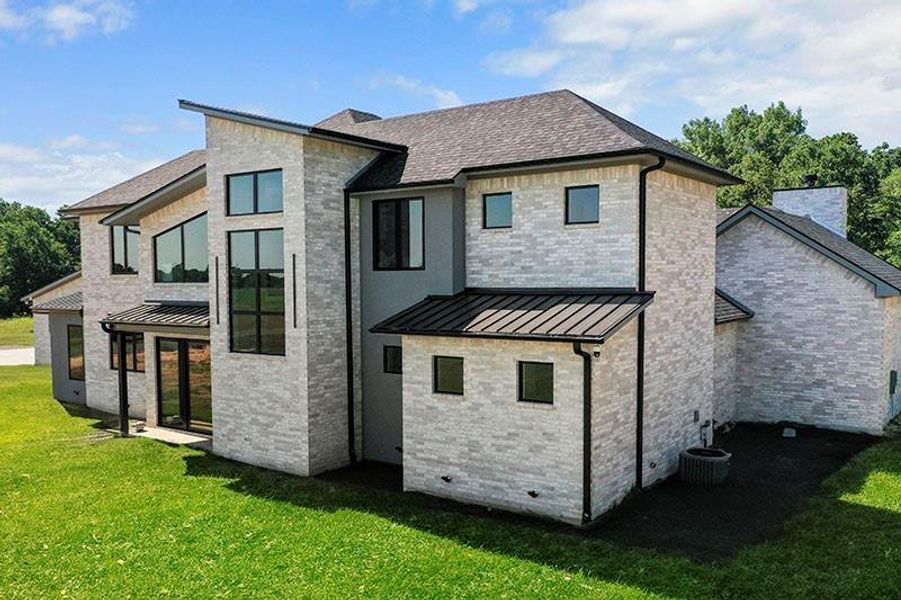 Exterior details and patio area of a home in , Sadler (Image 21).
