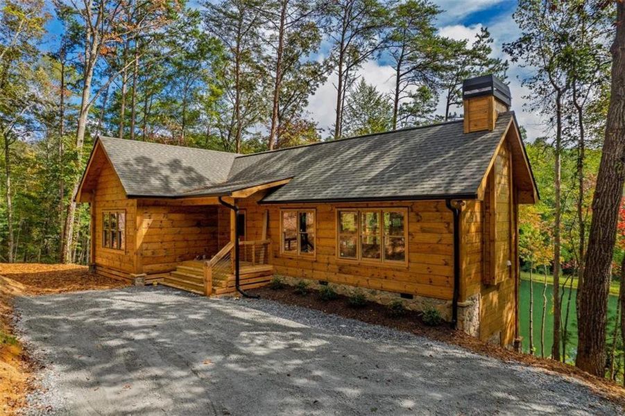 Exterior details and patio area of a home in , Cherry Log (Image 3).