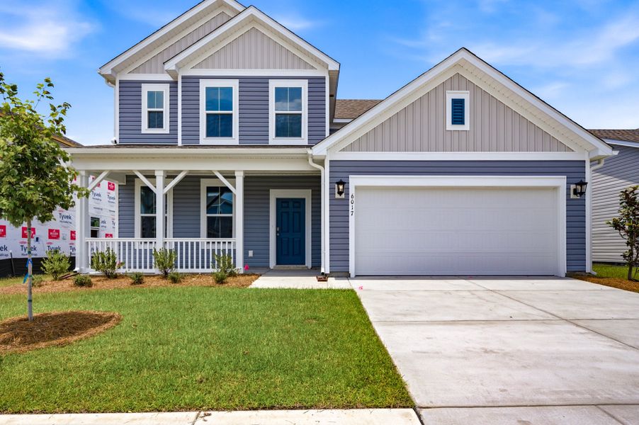 Front exterior of a new home in Somerset, Myrtle Beach, SC, highlighting curb appeal (Image 1). Front exterior of a new home in Somerset, Myrtle Beach, SC, highlighting curb appeal (Image 1).