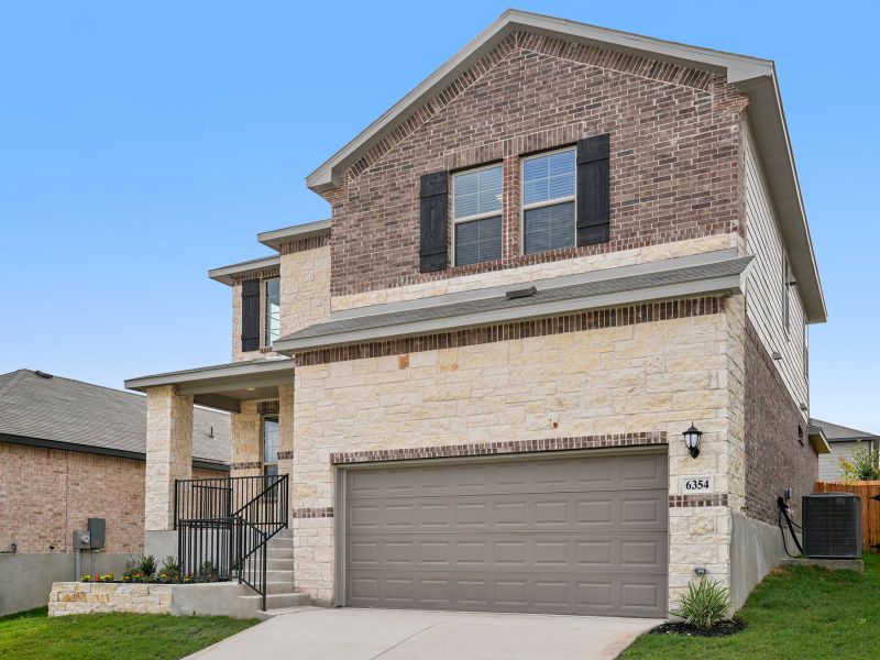 Front elevation C of the Medina in a Meritage Homes community. Front elevation C of the Medina in a Meritage Homes community.