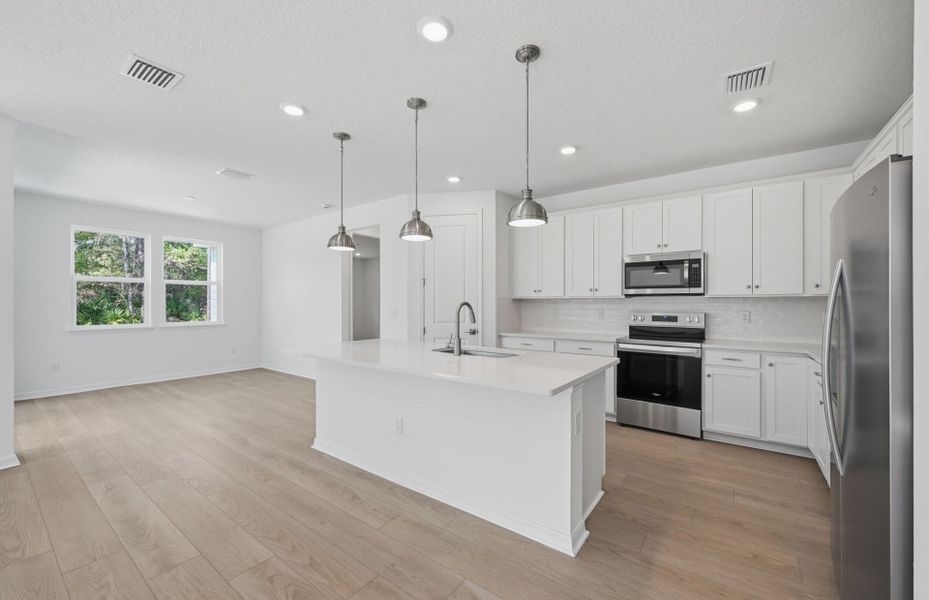 Furnished interior view inside a new home in Fiddler's Cove, Kingsland (Image 8).