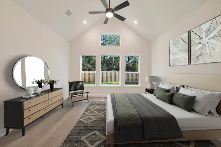 A King sized bedroom set leaves room for a sitting area as wlel