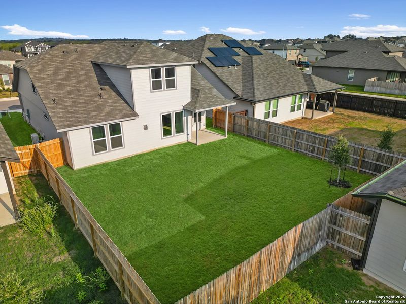 Front exterior of a new home in Morgan Meadows, San Antonio, TX, highlighting curb appeal (Image 2).